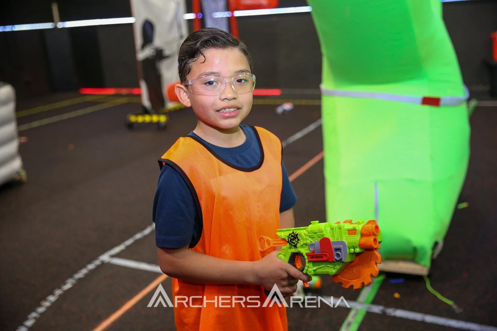 Friends playing indoor Nerf Wars in Toronto during fall