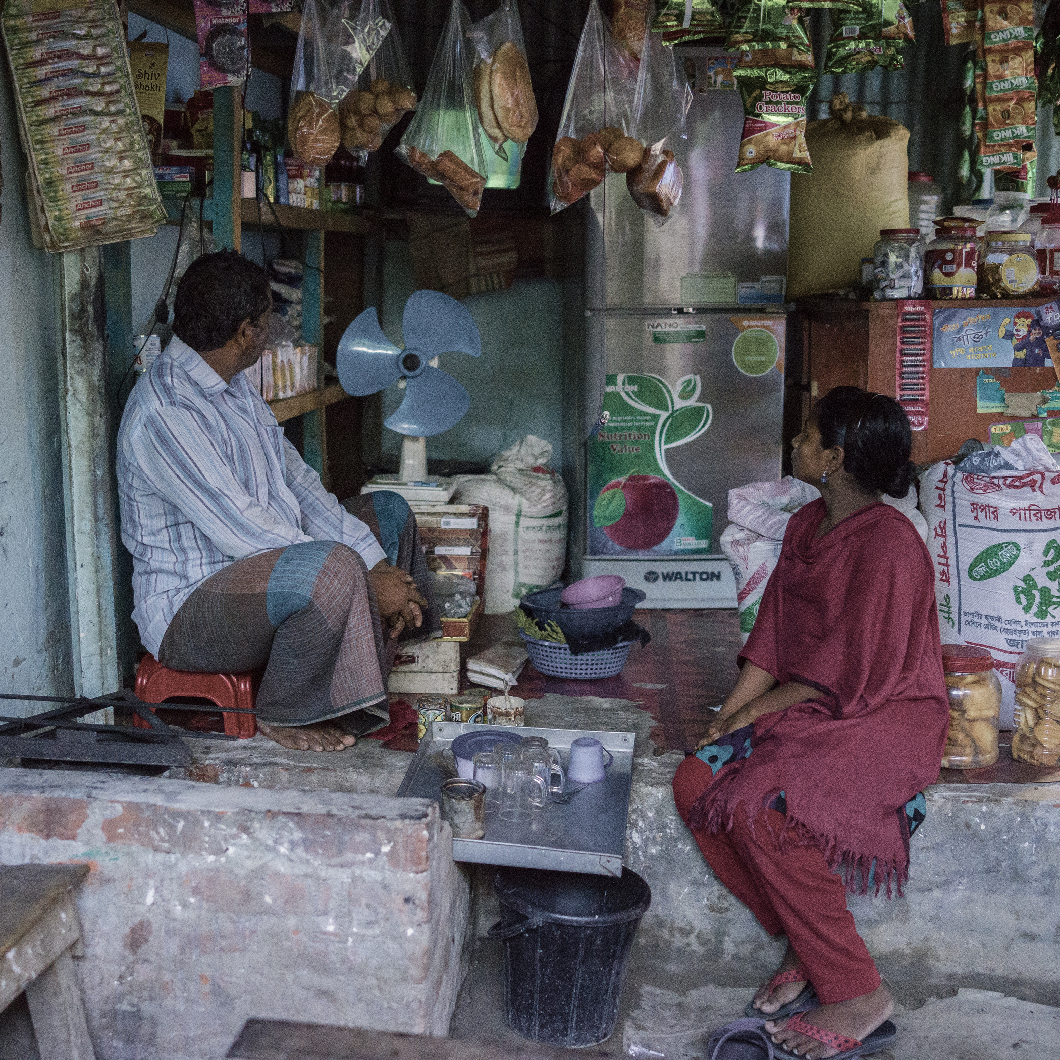 Mosammat Momota Khatun’s husband Mohammad Mojibur Rahman take cares of shop