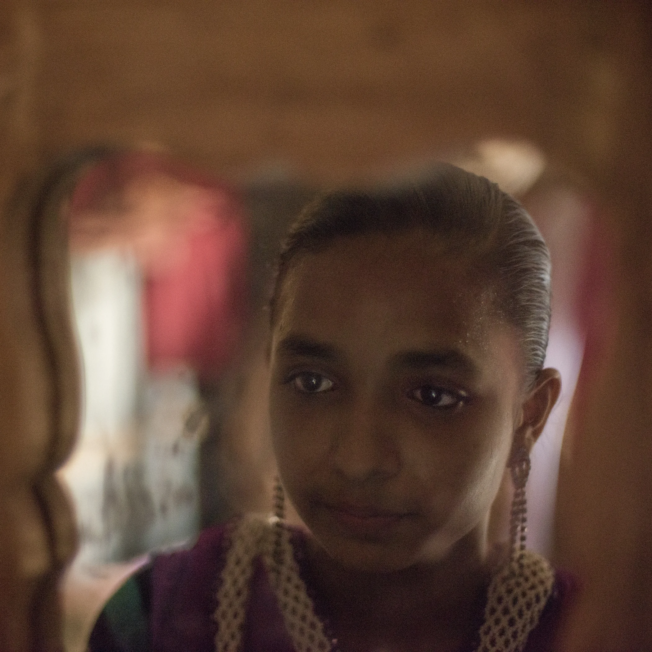 Lamia misses her mother throughout the day in almost everything she does inside the house.