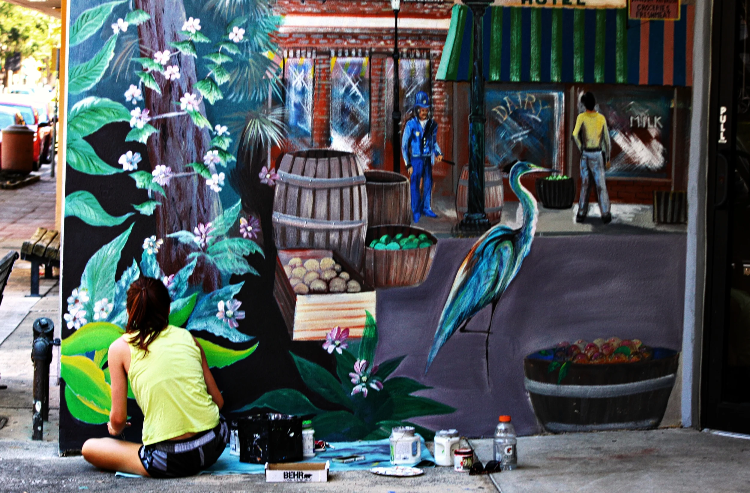 Meggan restores mural in cocoa village.jpg