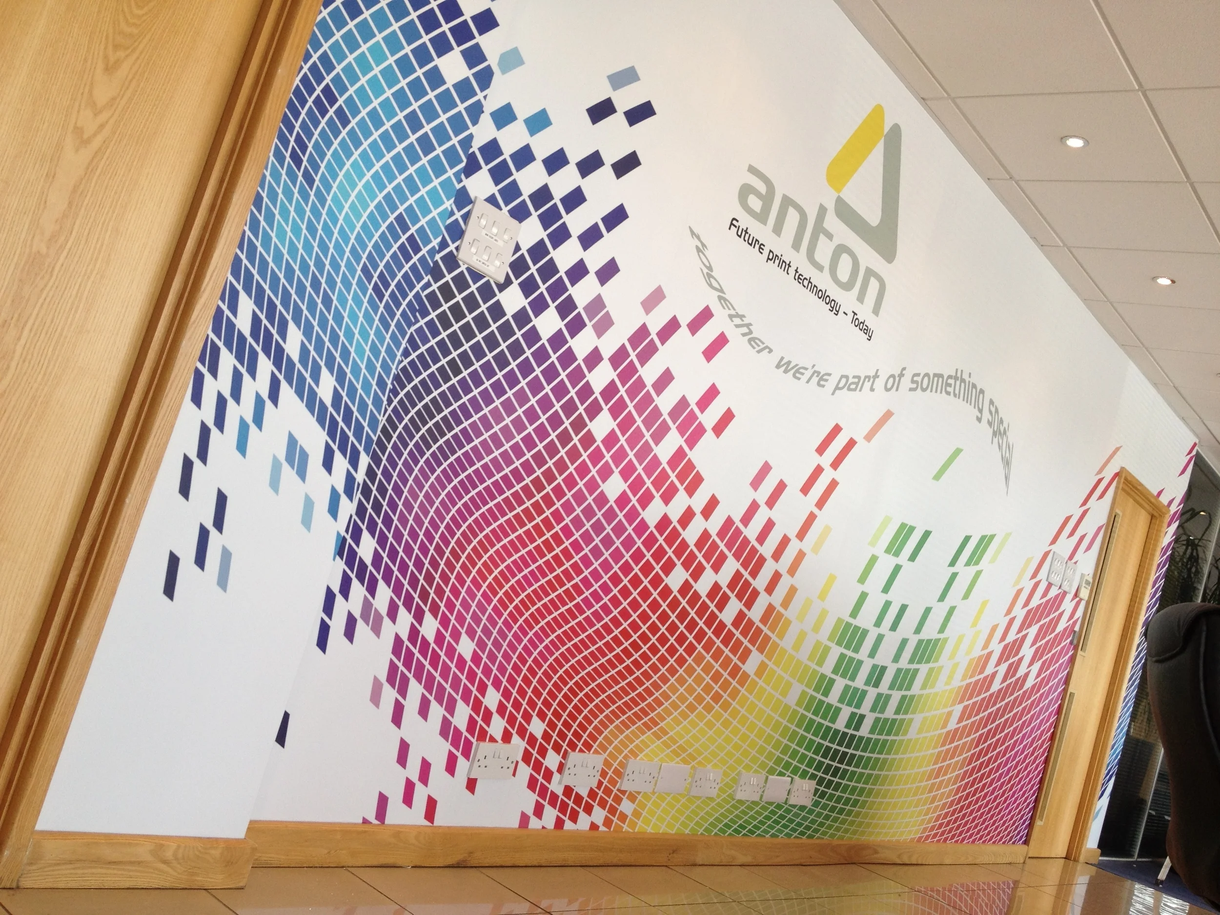 An office reception wall wrap installation