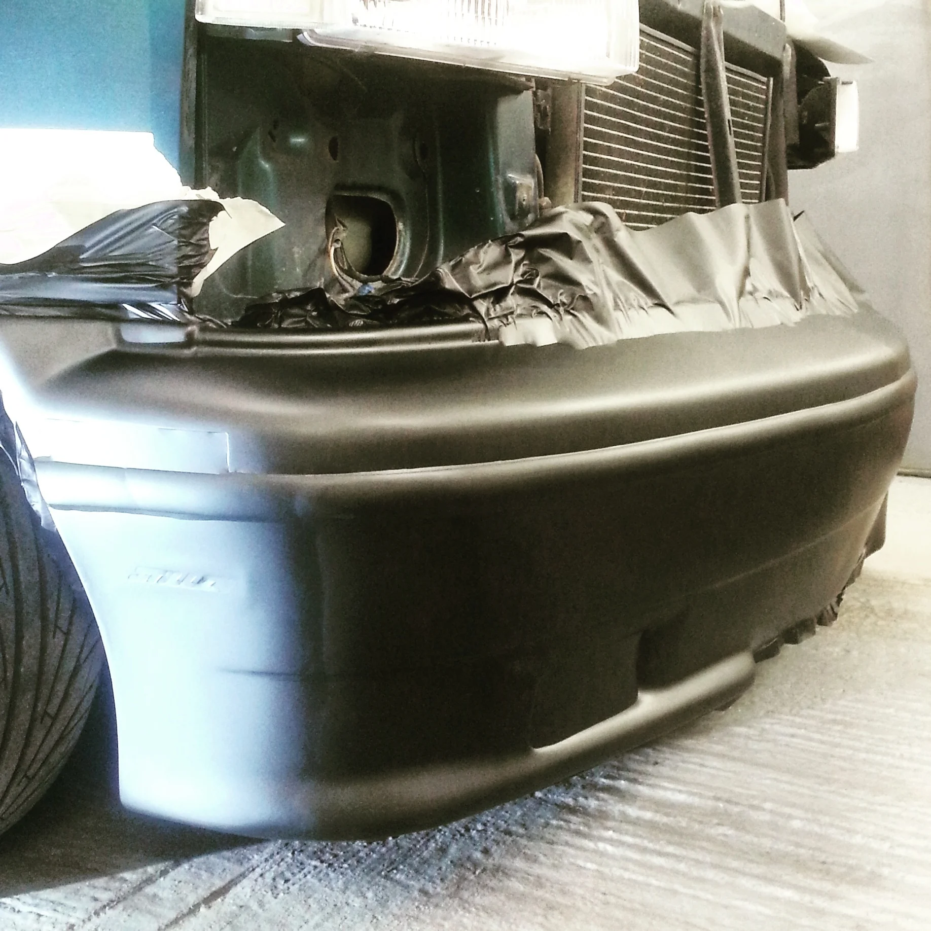 Chevrolet Astro front bumper wapped in Arlon Premium plus matt black