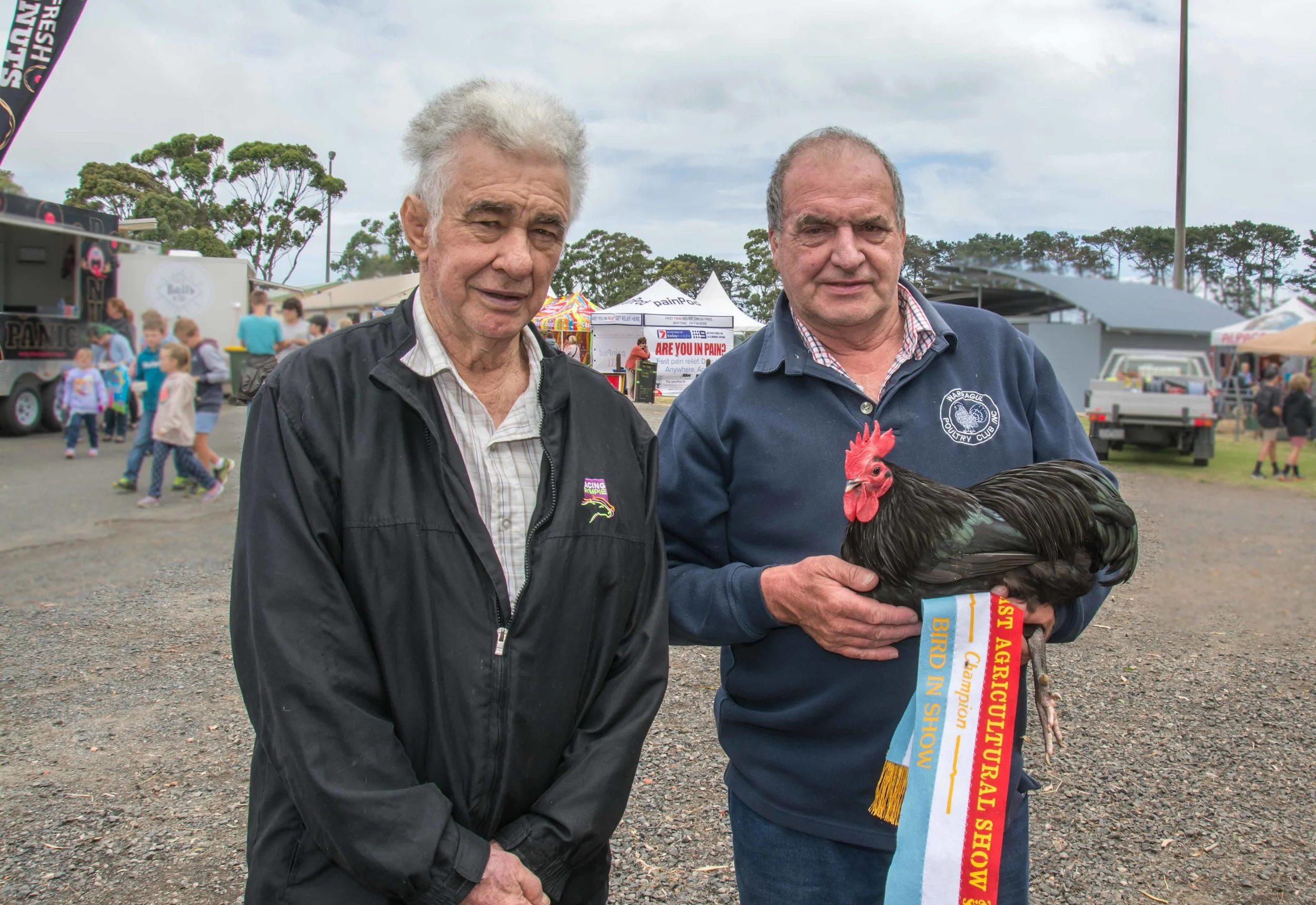 Judge Noel Nelson and winner of Best Bird in Show, Kevin Collins