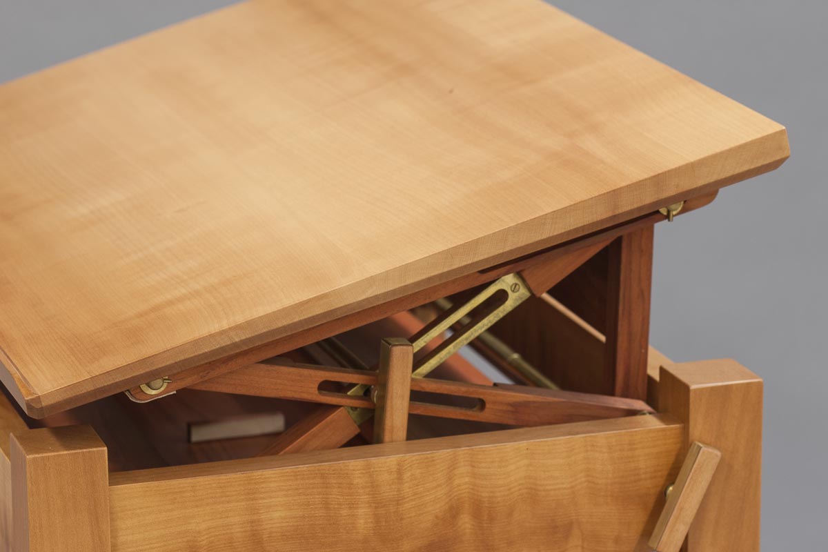 A original design, featuring complex faceted faces, a wooden locking mechanism and the local dream wood, madrone.