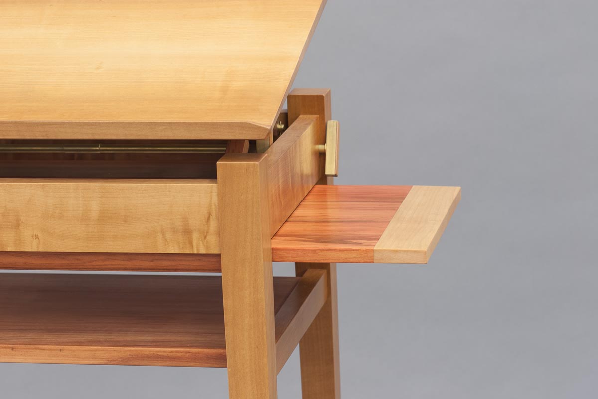 Aside from the work surface, there is a shelf and pull out tray, that can be extended to the left or right of the desk. Photos by David Welter