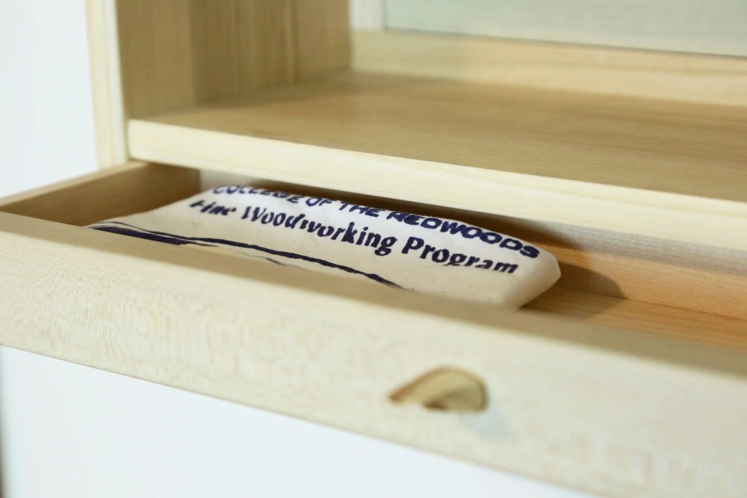 The small drawer is dovetailed at all four corners, and sized to house other small trinkets from my time at The Krenov School (formerly College of the Redwoods).