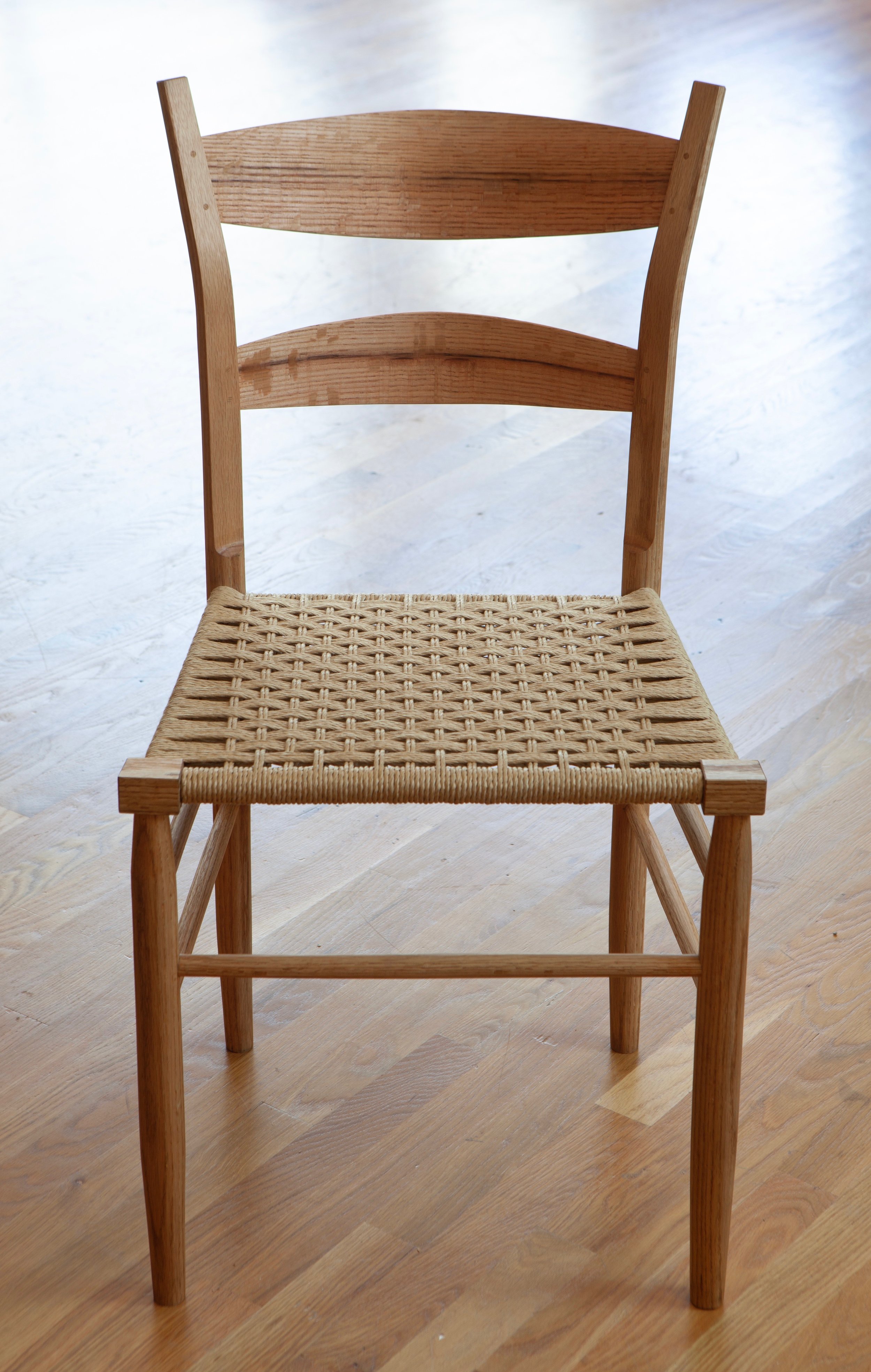 The back posts flare outward about 1/4” more than the first chair, as well – this was an experiment in comfort, trying to suss out small changes that may impact how the chair sits.