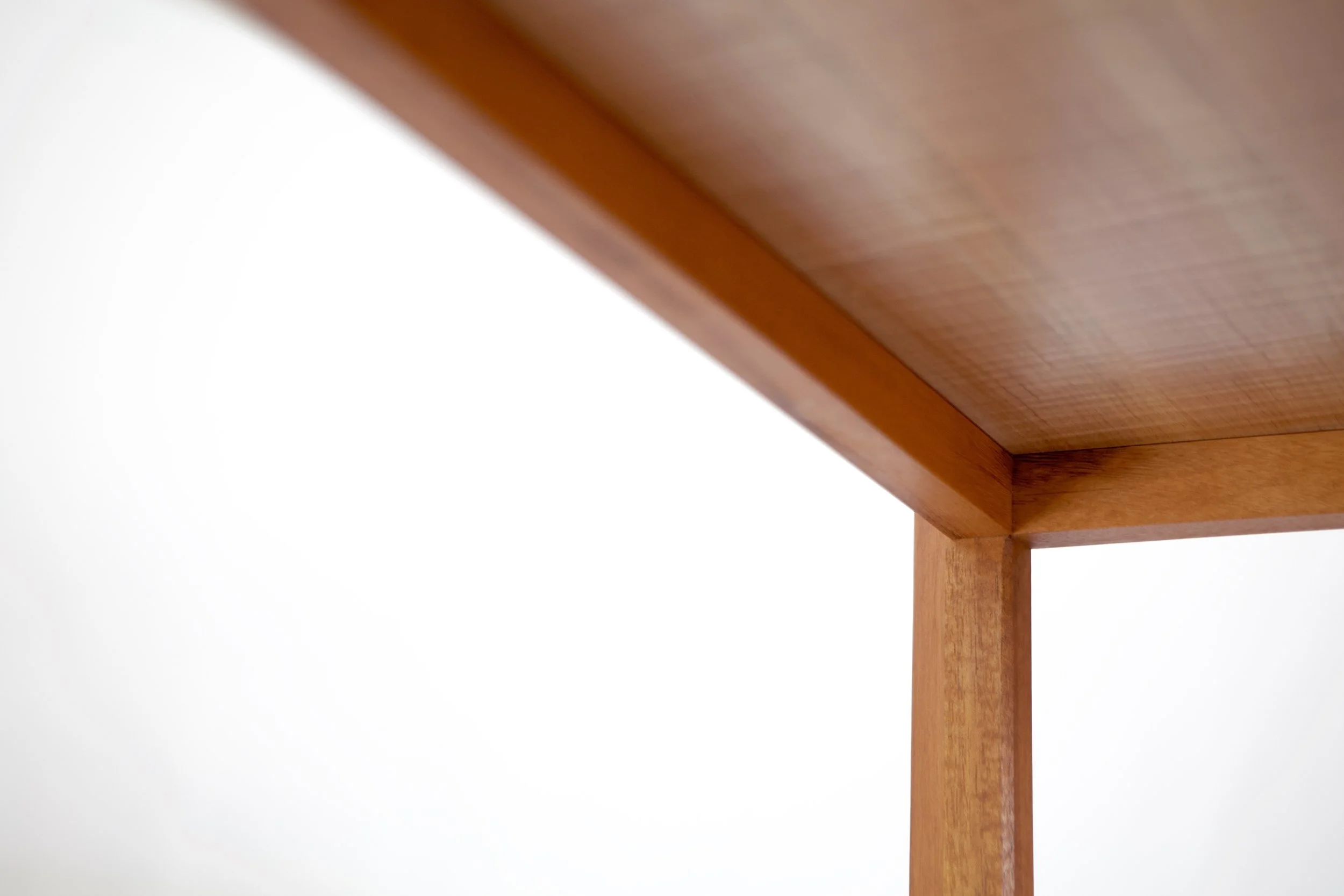 The carcase of the piece is made with mortise and tenon joints, which give a strength to this otherwise delicate form. The negative space in this piece is as important as the solid forms.