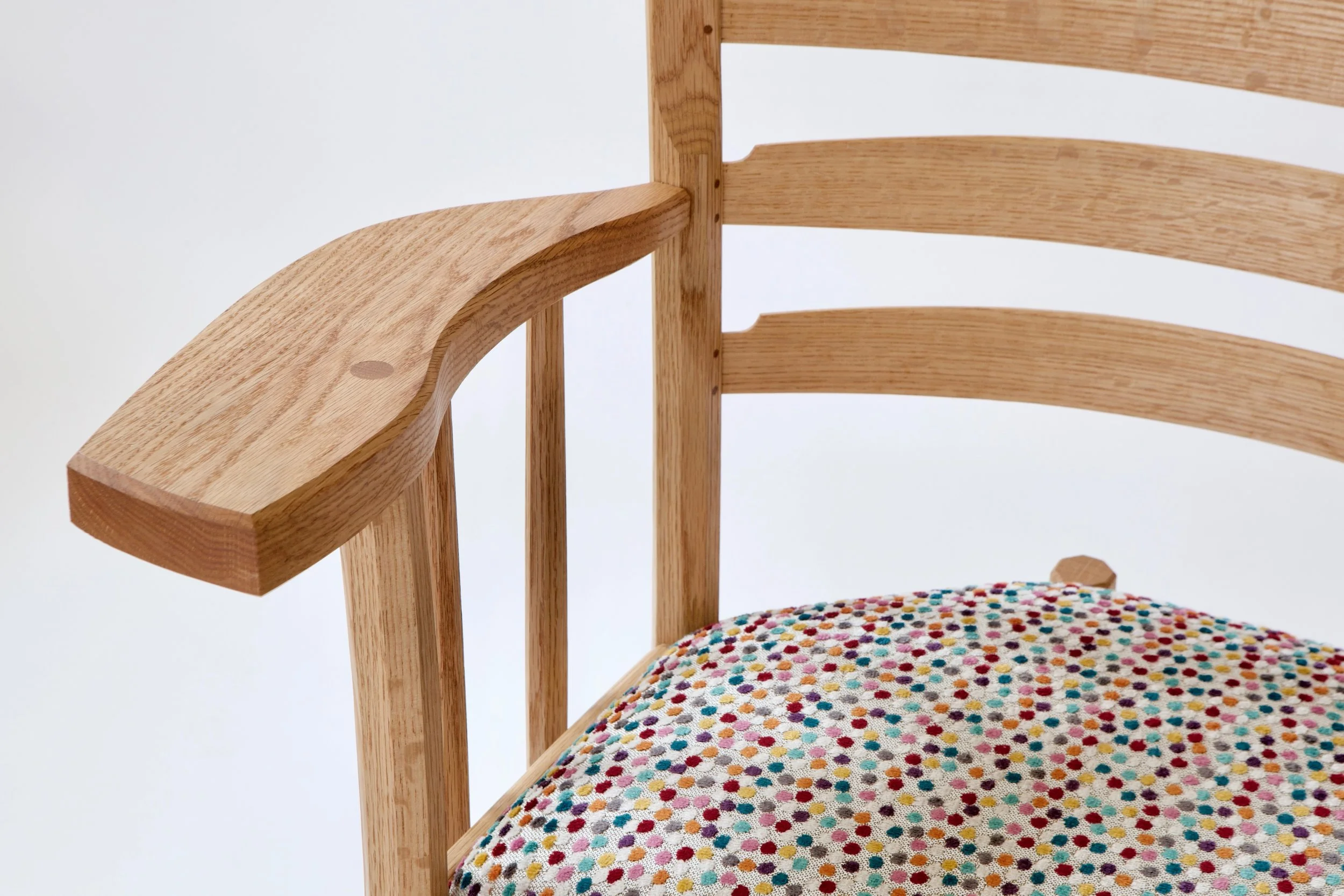  The seat drops into the frame, and is upholstered with a bold polka-dot pattern that I think captures the bombastic nature of Cornett’s designs, and adds a fun element to what is (in my opinion) an exciting and fun design. 