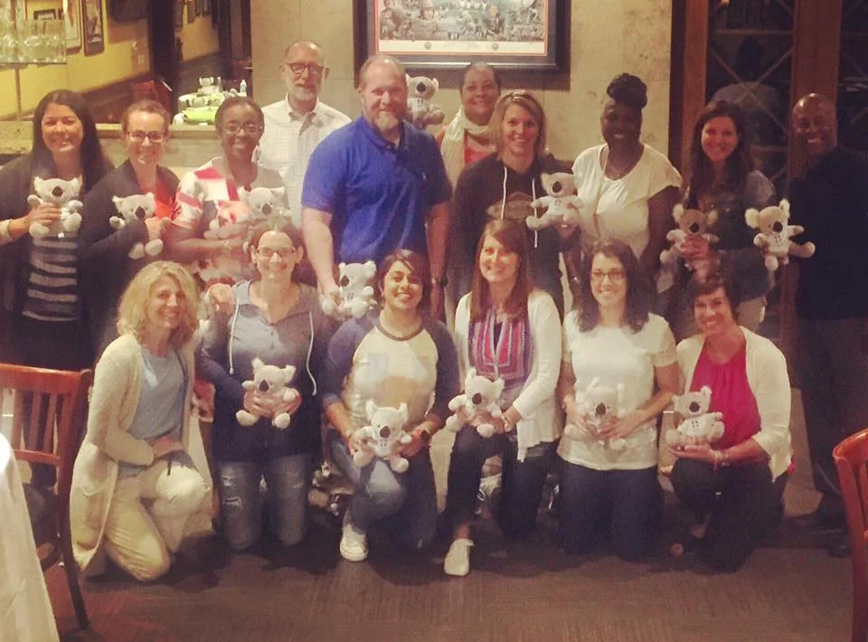 Shannon Decker and her Chicago YMHFA training group at graduation