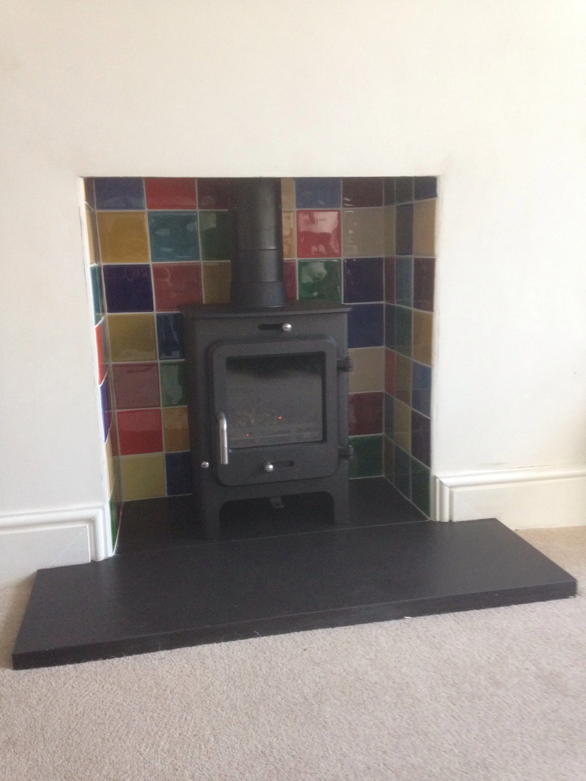 Stove installed Into the fireplace which was prepared by the customer