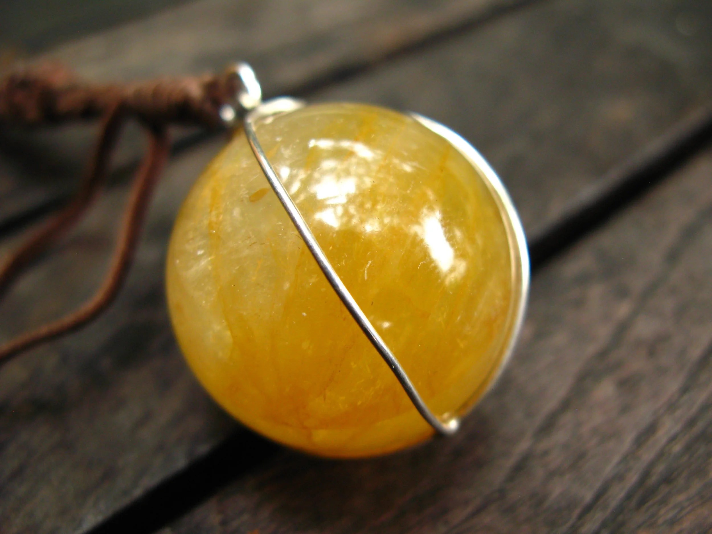 Leather and Yellow Rutilated Quartz Pendant Close Up