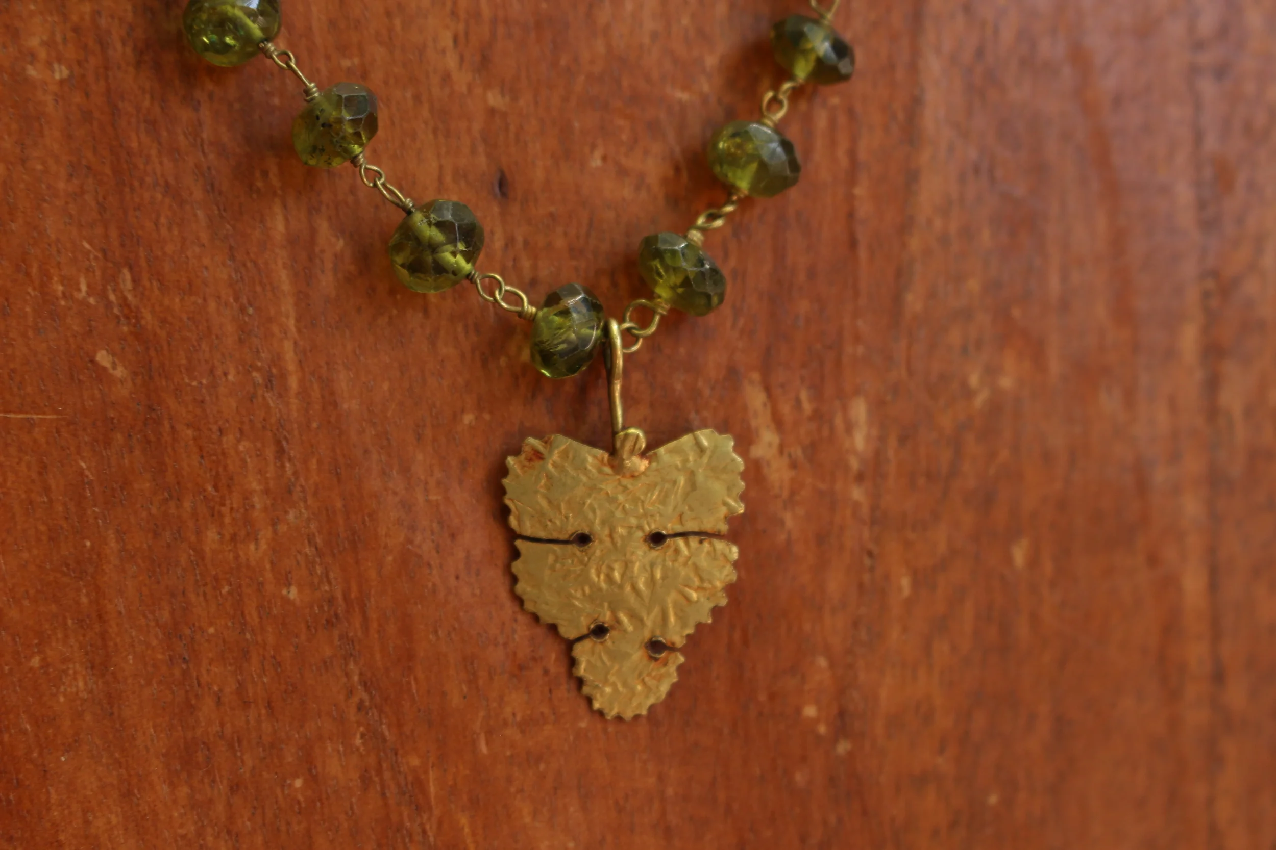 Peridot and Gold Leaf Necklace Close Up