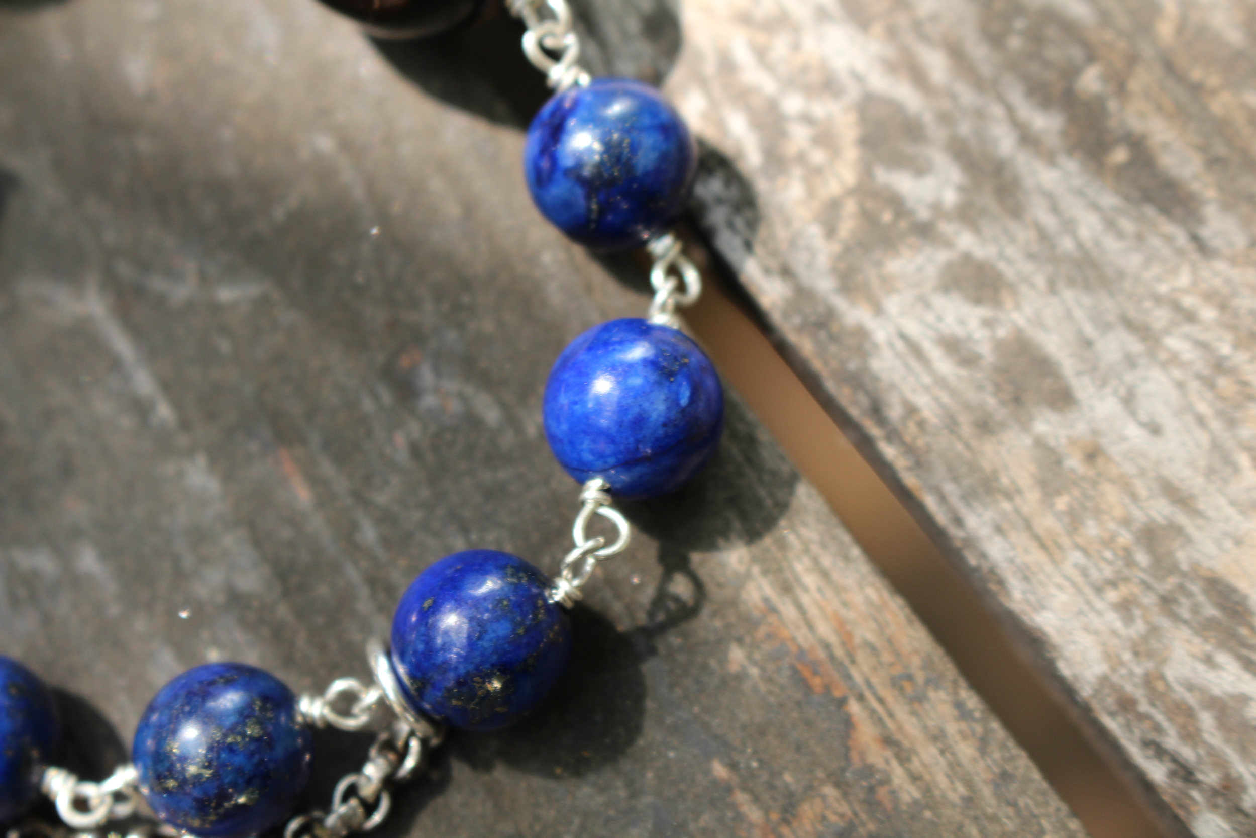 Lapis and Tiger Eye Skull Bracelet Beads Close Up