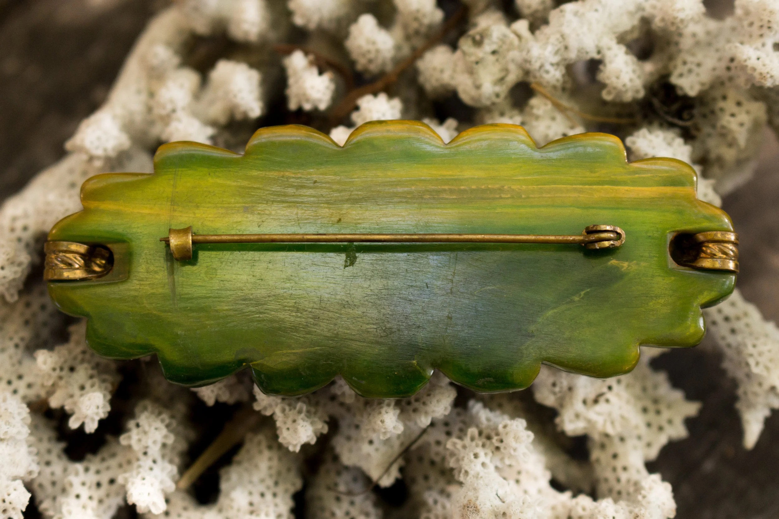 Green and Gold Bakelite Bar Pin Back