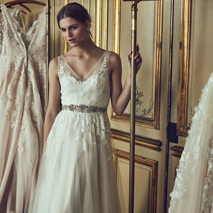 Flattering necklines, sheer overlays and beautiful lines are very BHLDN