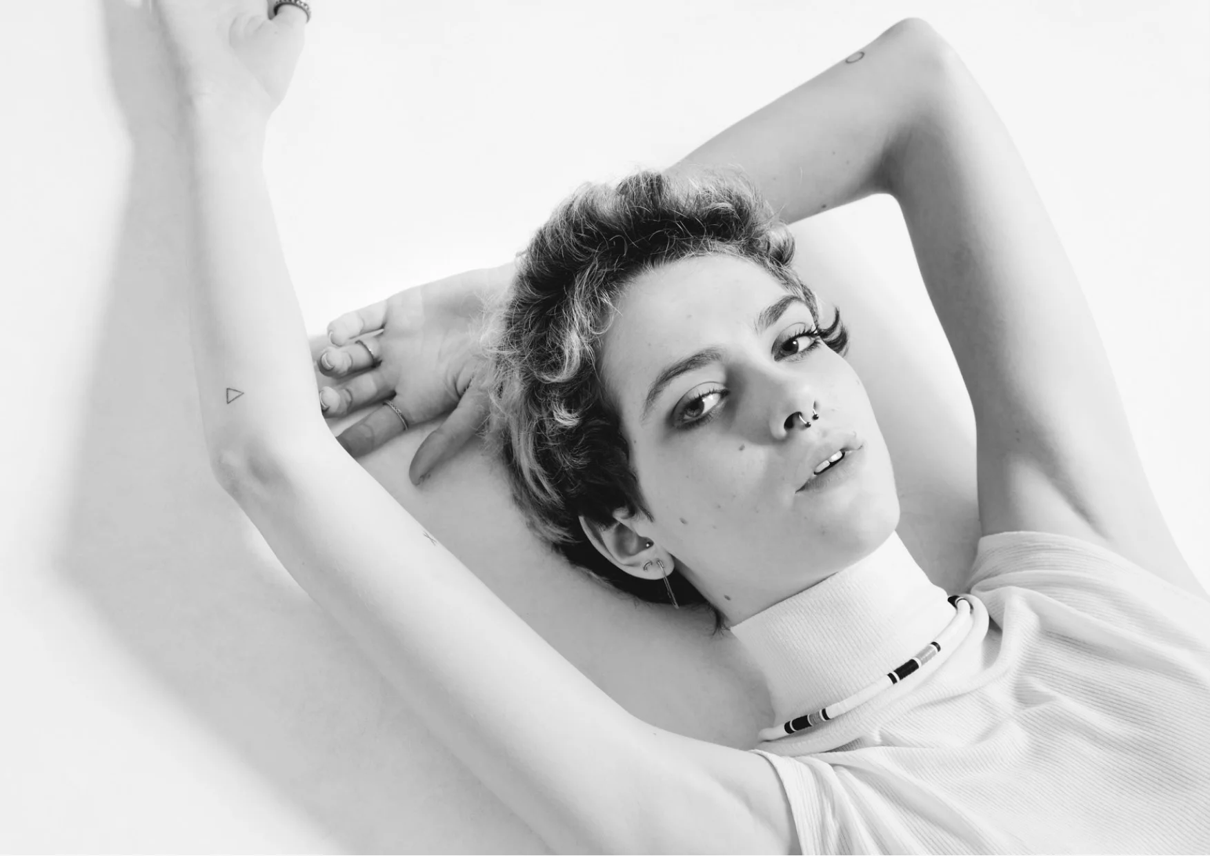 Amandine wears a top by COS & a necklace by LOUIS VUITTON 