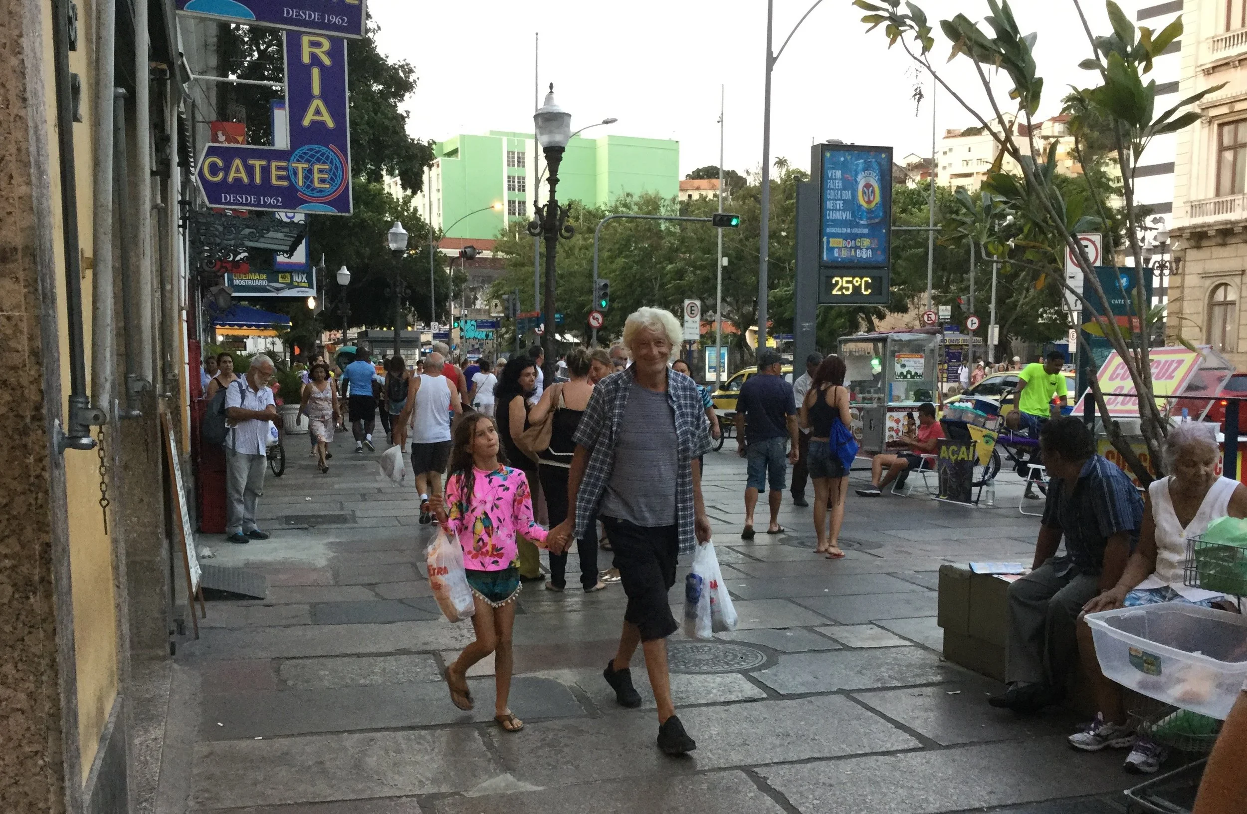 Dante and Lili walking home from the grocery store.