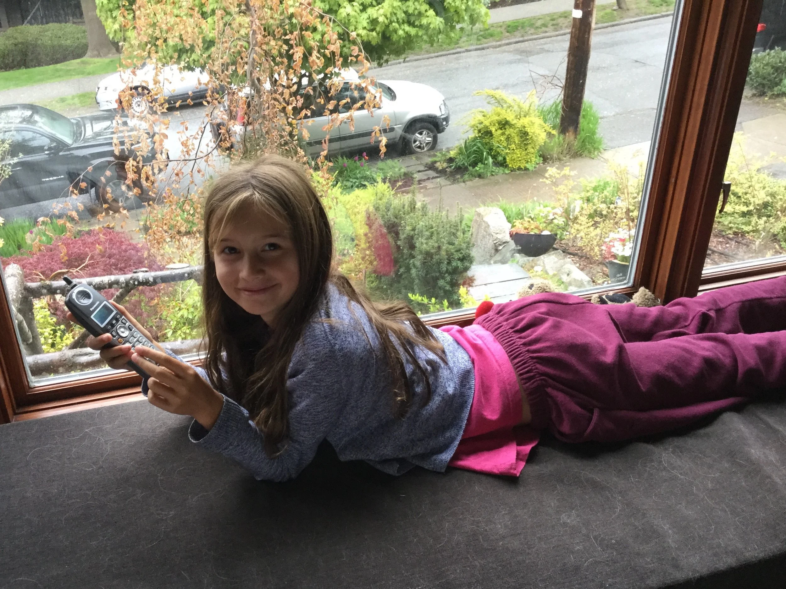Lili on speakerphone with Briar in Victoria. Briar's guinea pig was squeaking into the phone! 