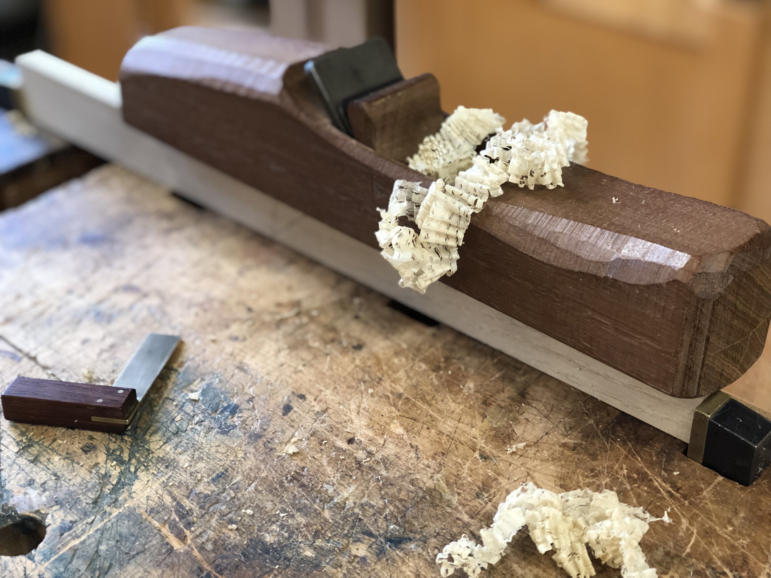 Wooden plane made from kwila. 13” long with a 1 3/4” wide iron