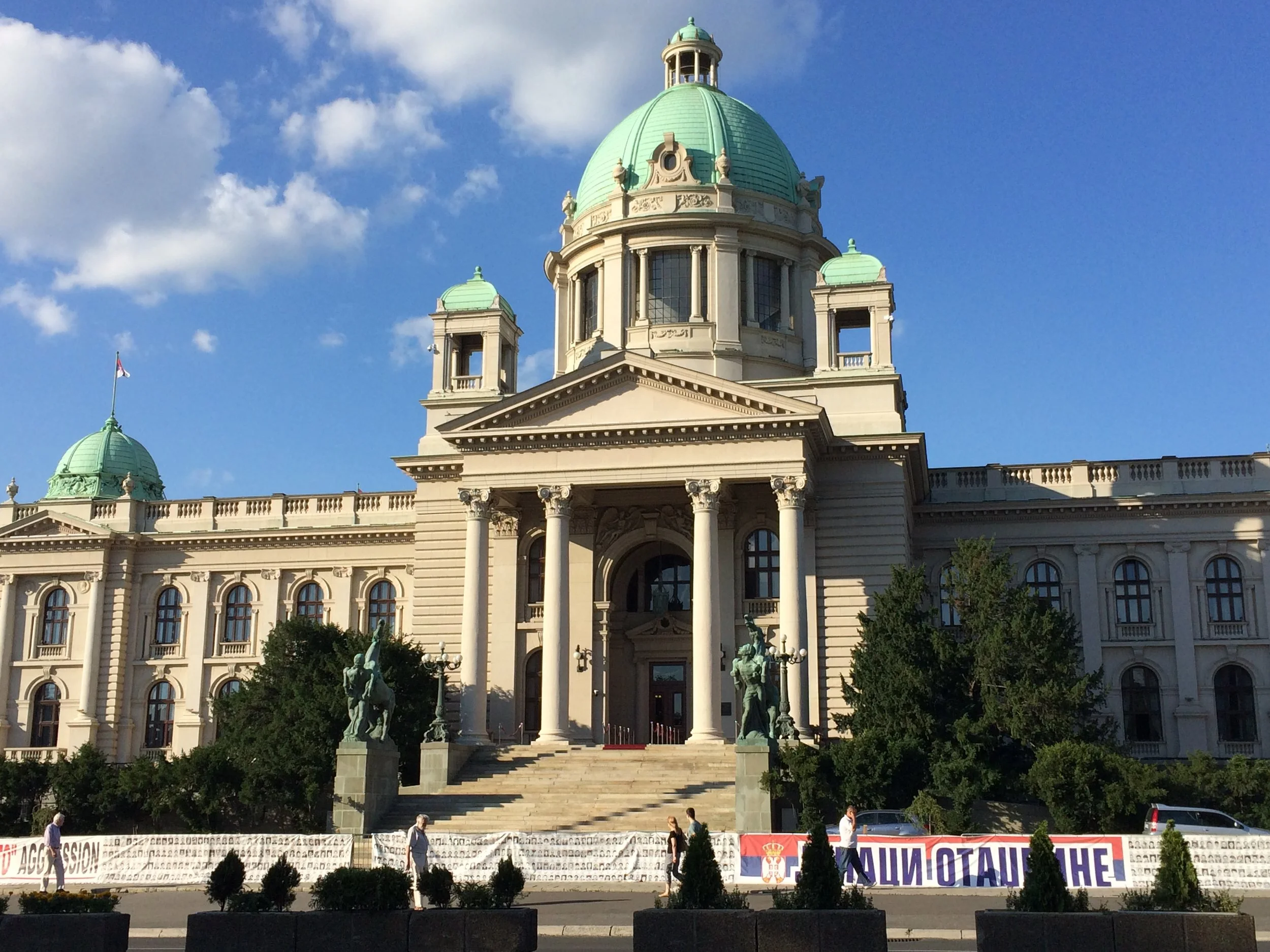 Government building. Signs outside are protests over Albanian terrorists.