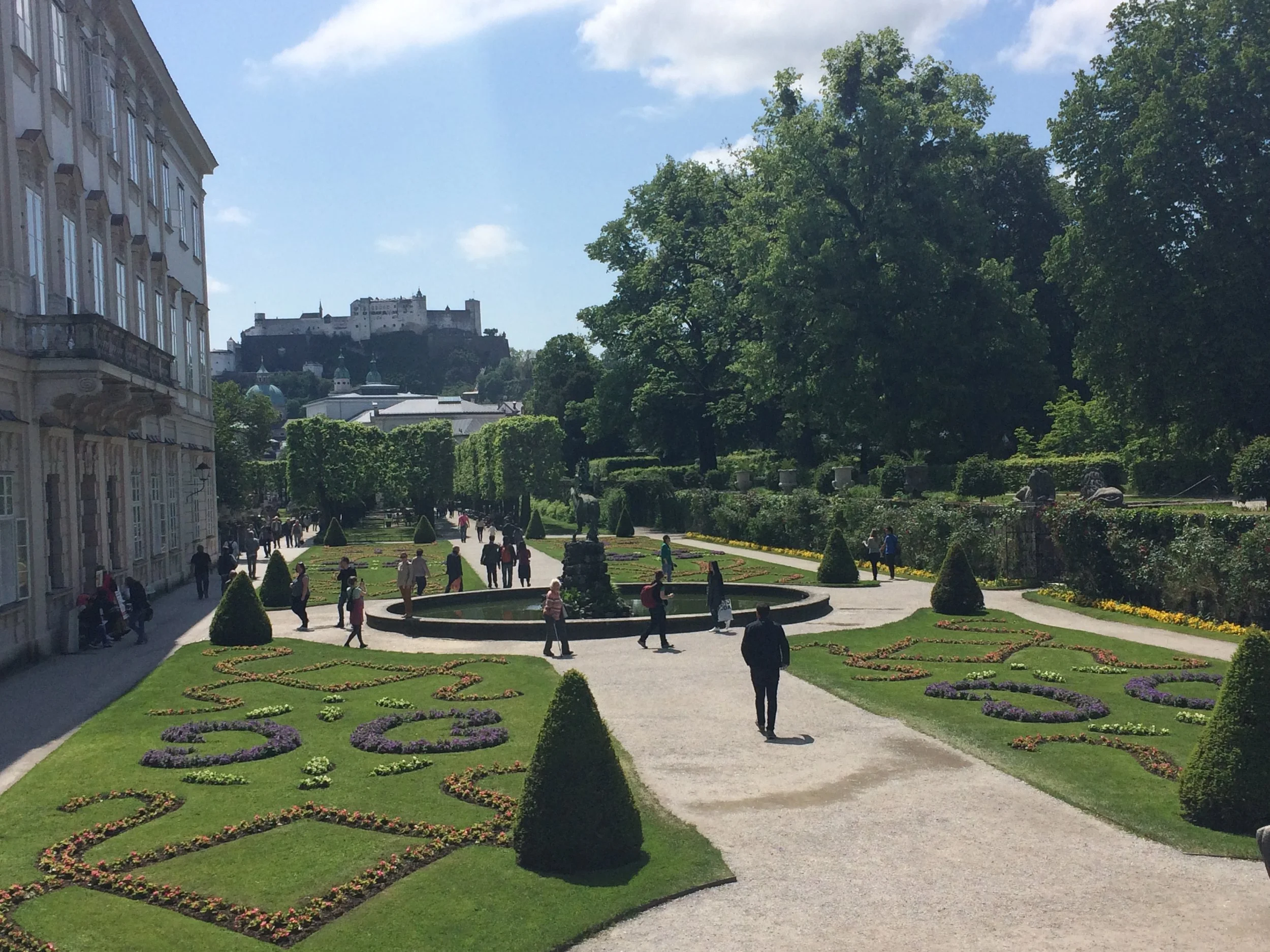Mirabell Gardens (where many of the Do Re Mi scenes were filmed in the Sound of Music) with Salzburg Fortress in the background