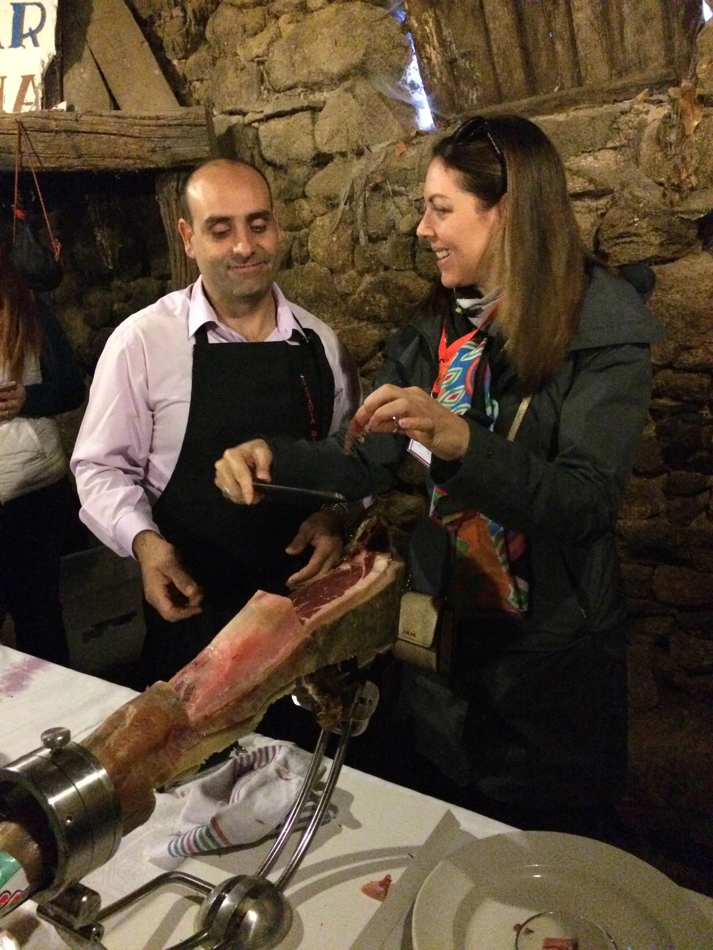 Learning to slice Iberico ham from the master. You can tell by his face how well I did!