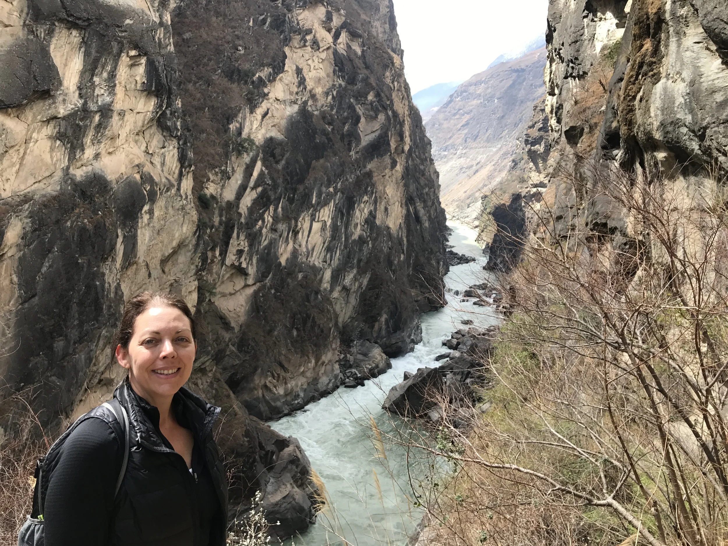 Success! Reaching the bottom of Tiger Leaping Gorge, Yunnan, China.