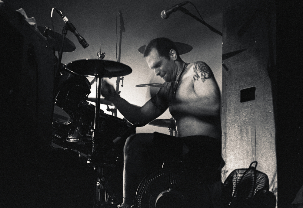 Ted Parsons, playing the drums
