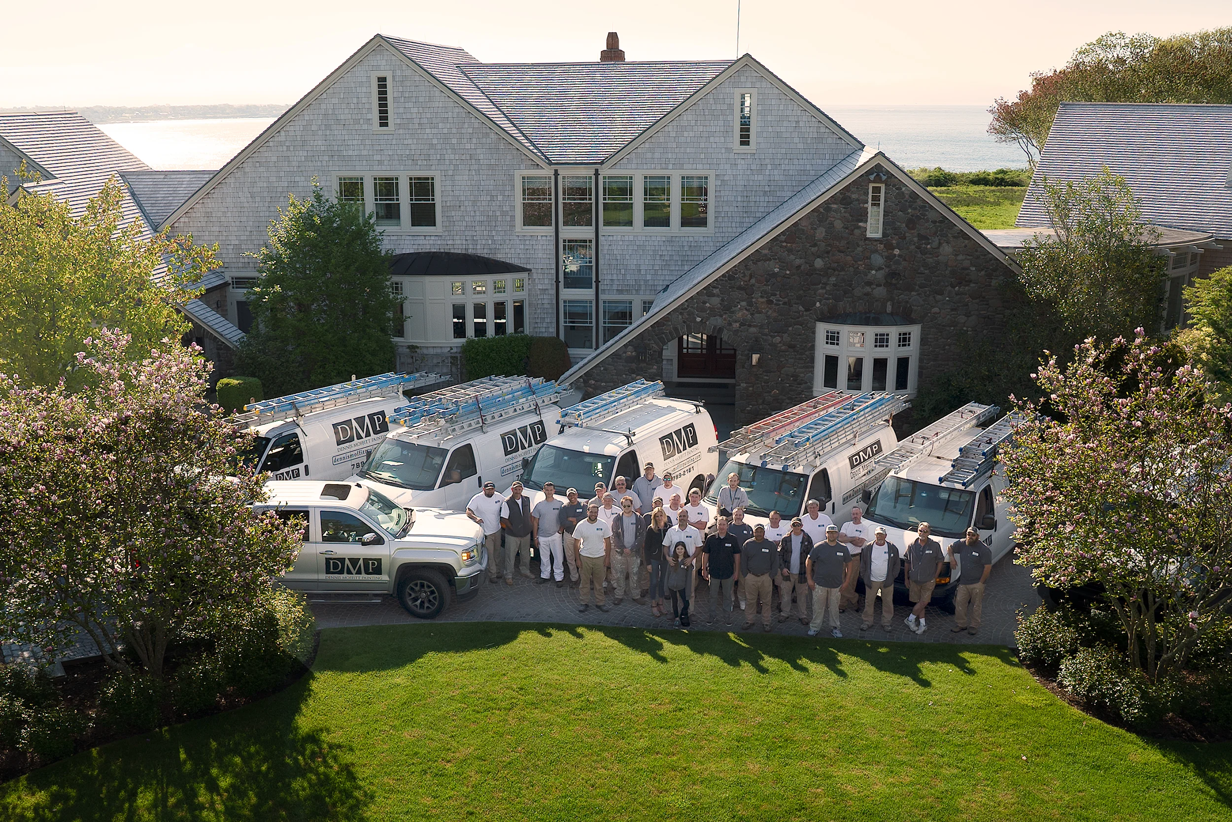 Team Photo of Dennis Moffit Painting