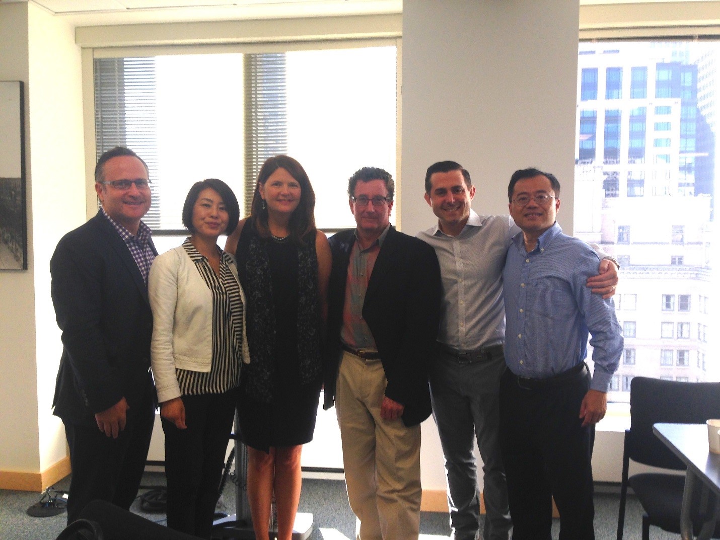 (From Left): Dean Jones, Realogics Sotheby's International Realty; Holly Yang, Kidder Matthews; Kristi Heim, Washington State China Relations Council; John Spear, Tigeroak Publication; Marc Berger, Nyhus Communications; and ZhaoHui Tang, adSage