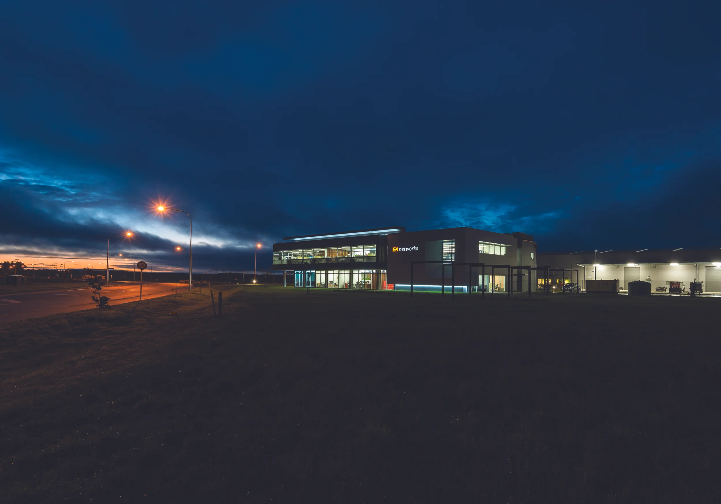 A large-scale rebrand for EA Networks, electricity distribution and fibre optic communications network, including the development of a new name, brand identity, website development, corporate collateral and livery, consumer and stakeholder communications, internal/staff engagement, spatial design, including building and site signage, wayfinding systems and office interior graphics.