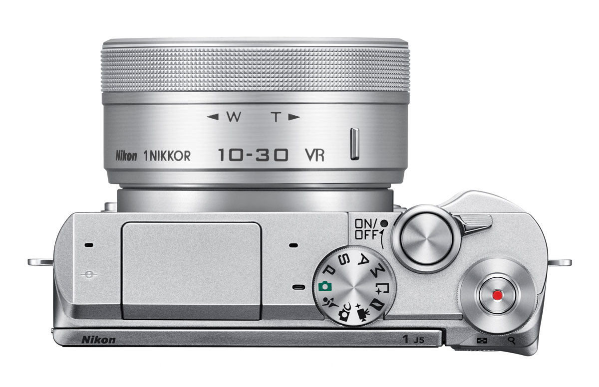 The Nikon 1 J5 top deck has a very clean layout