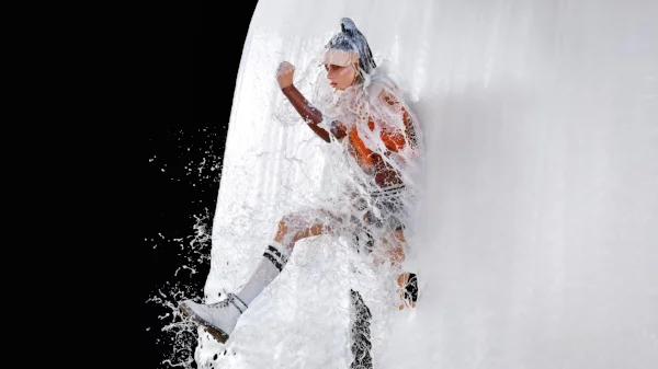 This image of a fashion model blasting through a wall of white paint demonstrates the power of Freeze mode. The entire video is available on the Profoto site. Very cool, take a look