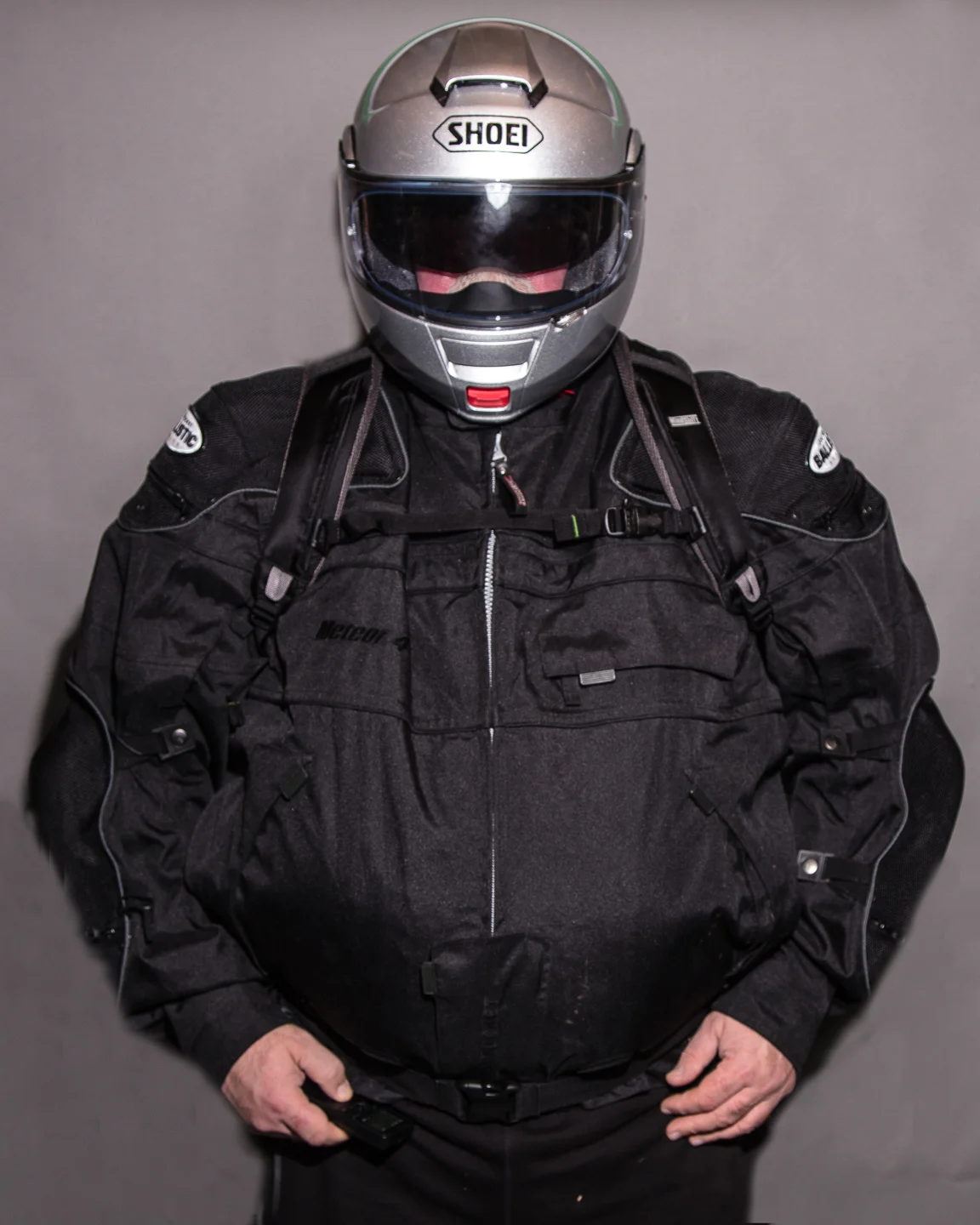 The FirstLight 30L worn over the bulky but warm Joe Rocket winter capable Meteor jacket. I have since lower the sternum strap to the lowest position to try to alleviate binding of the shoulder straps under the arms