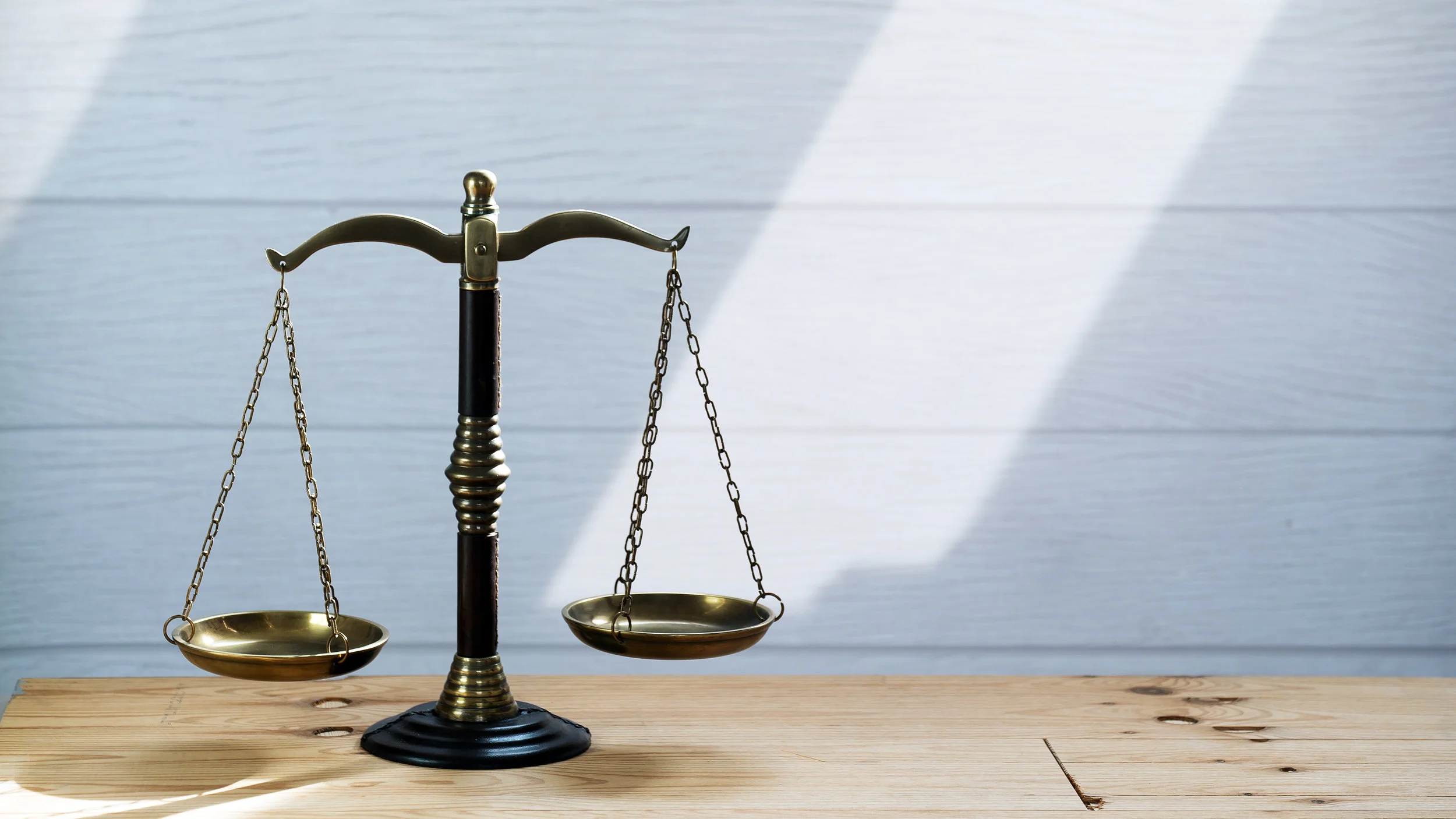 Law scales on table background. Symbol of justice