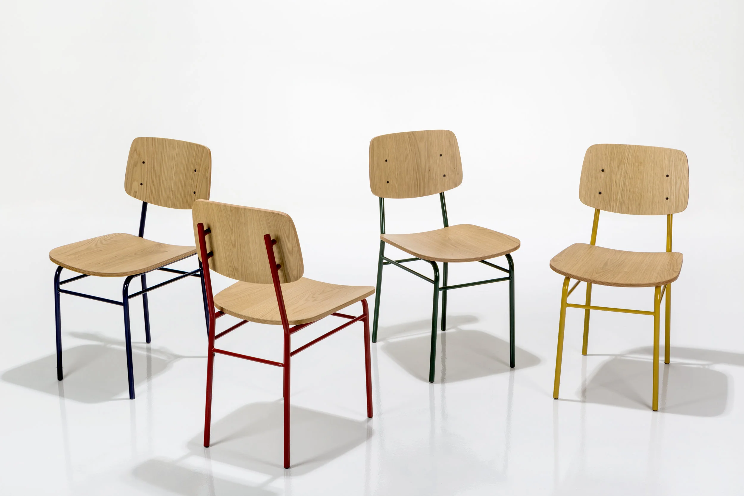 Versatile, honest and fun. Lola is a collection of seating pieces disegned for Perceptual . A lightweight family composed of chairs and stools that adapts to different spaces, uses and moments of the day. Lola evokes the aesthetics of school furniture of the 50s, and has a variety of colors and finishes like natural oak veneer, colored oak veneer, ash veneer, walnut veneer, pine wood and upholstery. Pieces that can work at home, trade and work spaces. This collection was developed within Perceptual’s design team as creative leader.