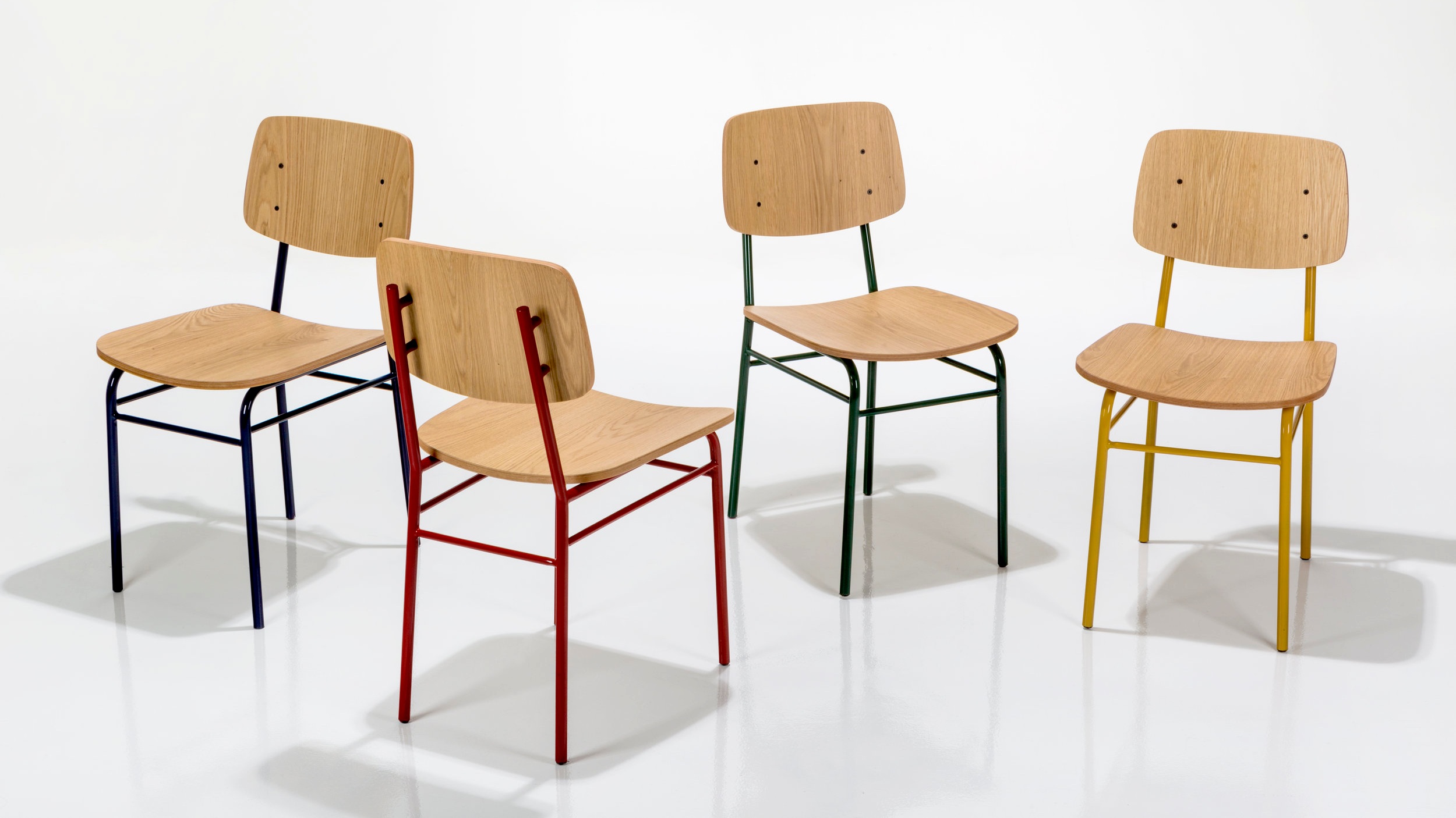 Versatile, honest and fun. Lola is a collection of seating pieces disegned for Perceptual . A lightweight family composed of chairs and stools that adapts to different spaces, uses and moments of the day. Lola evokes the aesthetics of school furniture of the 50s, and has a variety of colors and finishes like natural oak veneer, colored oak veneer, ash veneer, walnut veneer, pine wood and upholstery. Pieces that can work at home, trade and work spaces. This collection was developed within Perceptual’s design team as creative leader.
