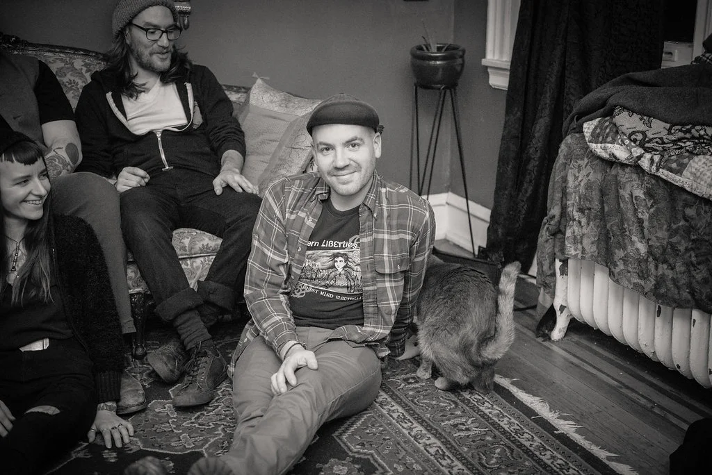 Robin the Guitarist and a Cat Butt