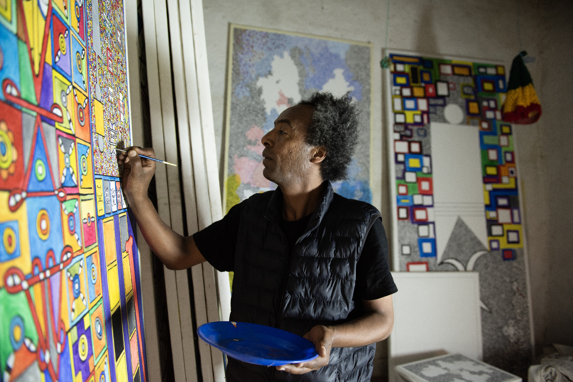  Henok Melkamzer working in his studio, 2023.&nbsp; Photo: Michael Tsegaye 