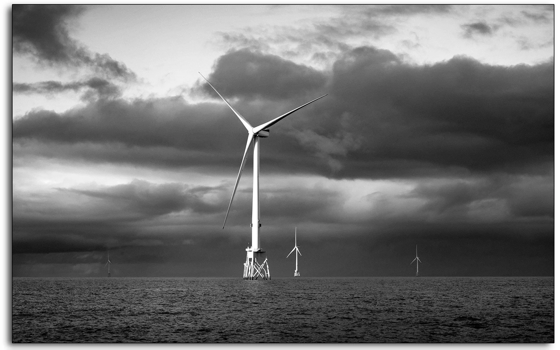 offshore-wind-turbine-storm-clouds-north-sea-black-and-white.jpg