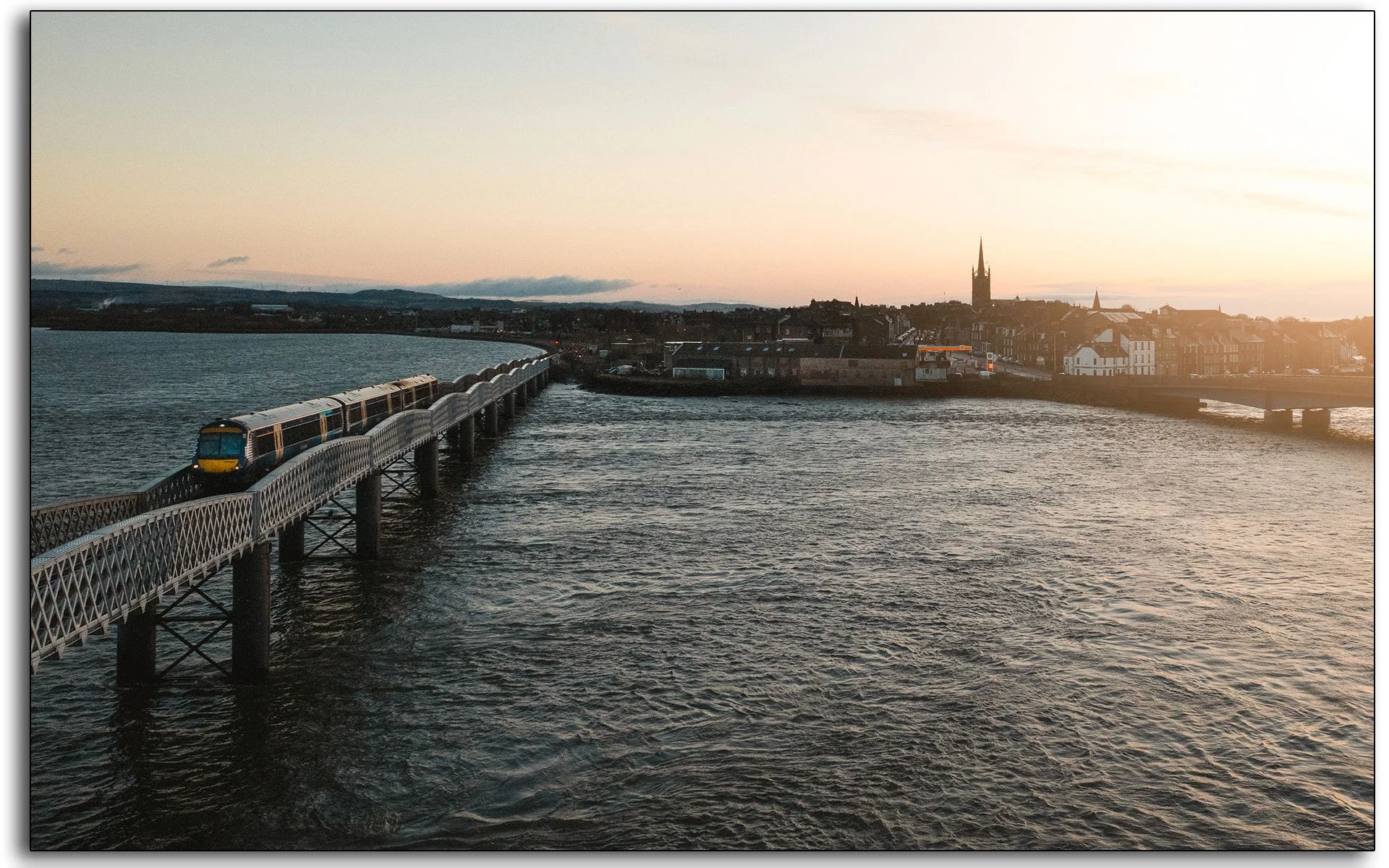 Montrose-Scotrail-LNER-train-bridge-sunset-sunrise- virgin-Scotland.jpg