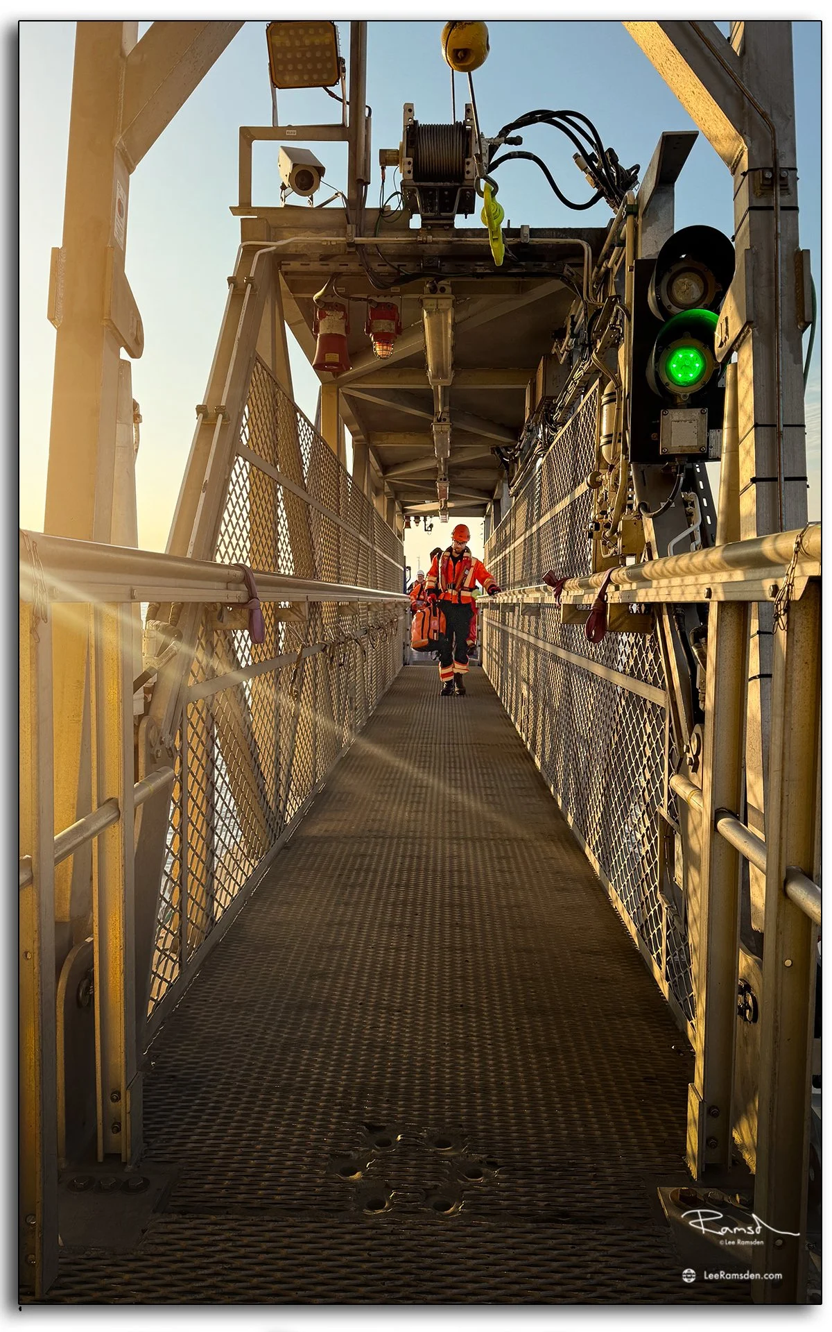 Walk-to-Work bridge with green light signal showing safe step-over for offshore personnel.