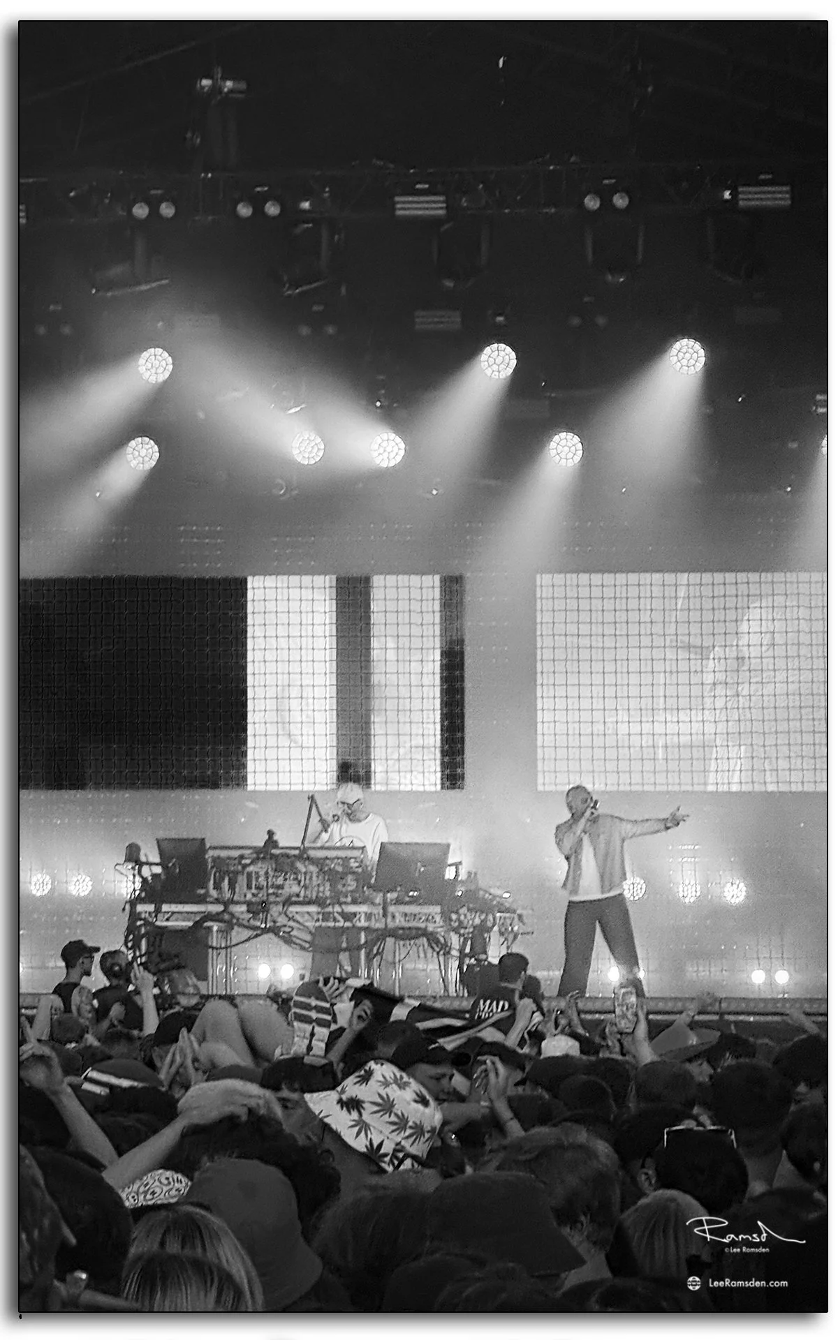 Underworld performing live at TRNSMT Festival on the King Tut’s Stage with bright lights.