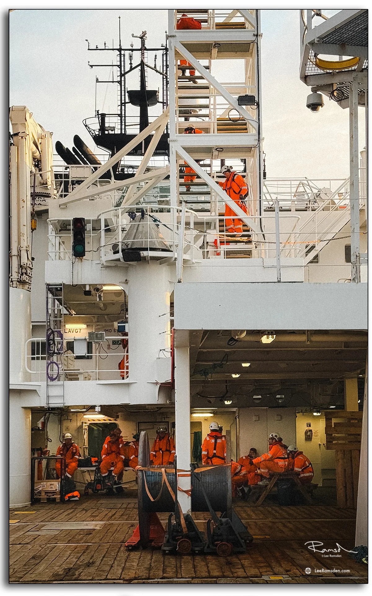Offshore workers in PPE on SOV deck preparing for North Sea wind operations