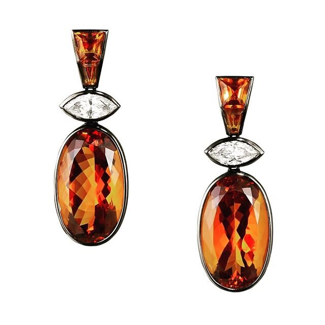 One Pair of Unique Custom Cut Madeira Citrine and Marquise Diamond Earrings mounted in 18kt Black Gold.  Oval Madeira Citrine @ 45.39 cts, Diamonds GIA I SI2 @ 2.69 cts.