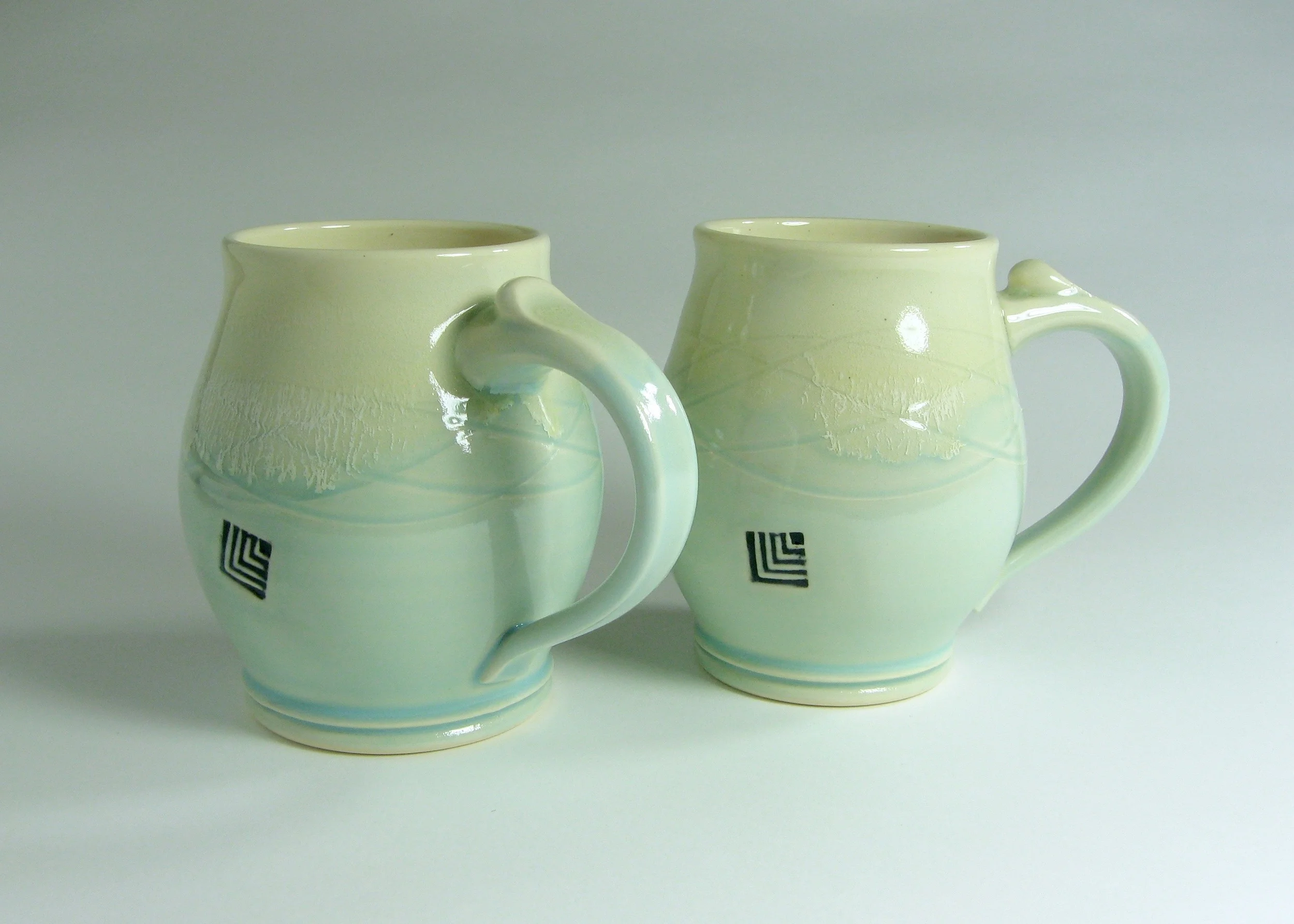 Mugs with inlaid stamp detail