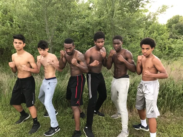 Main St Gym Boxers posing before going in different directions to compete.