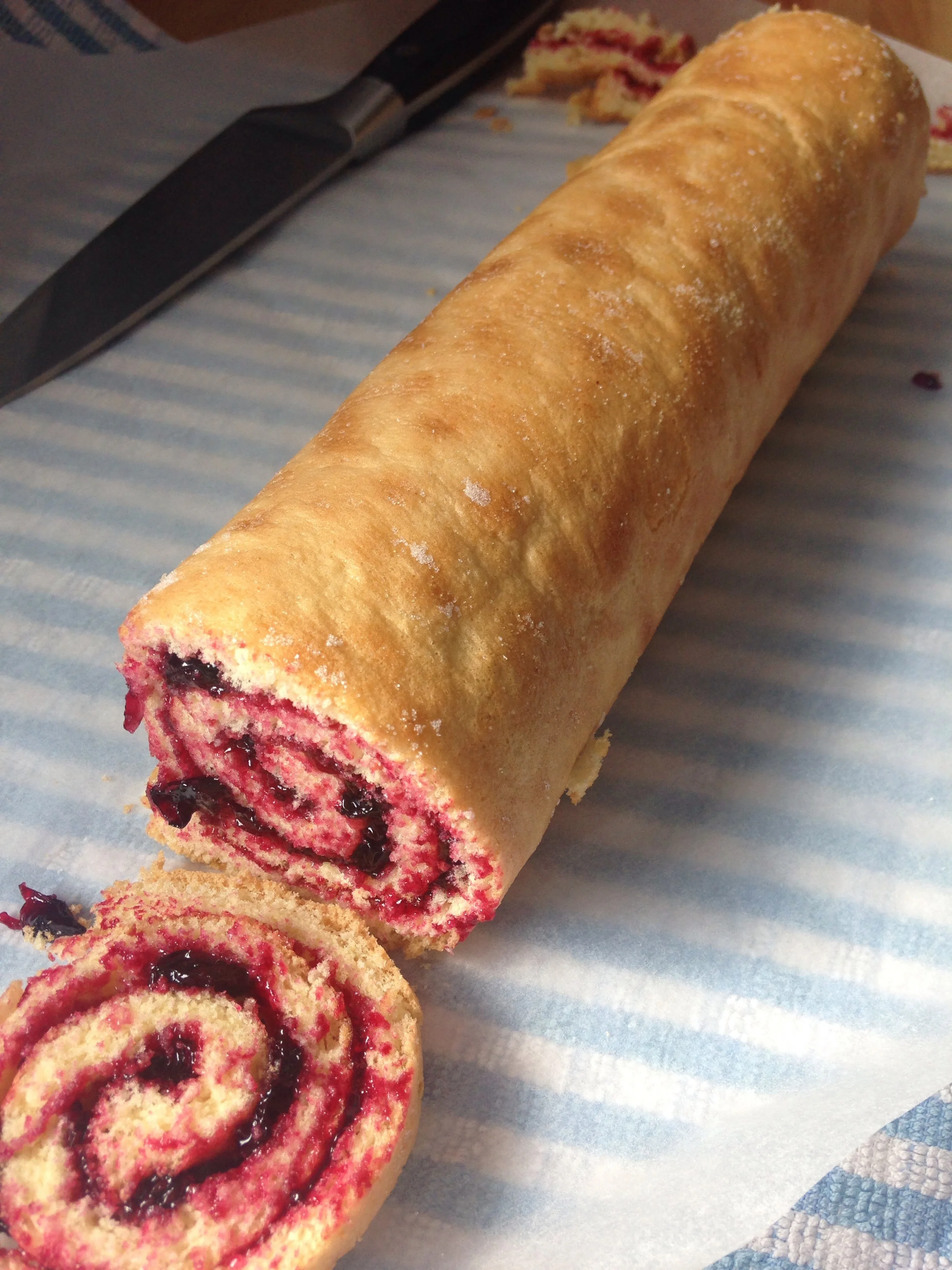 Homemade Swiss roll with homemade Blackcurrant jam.