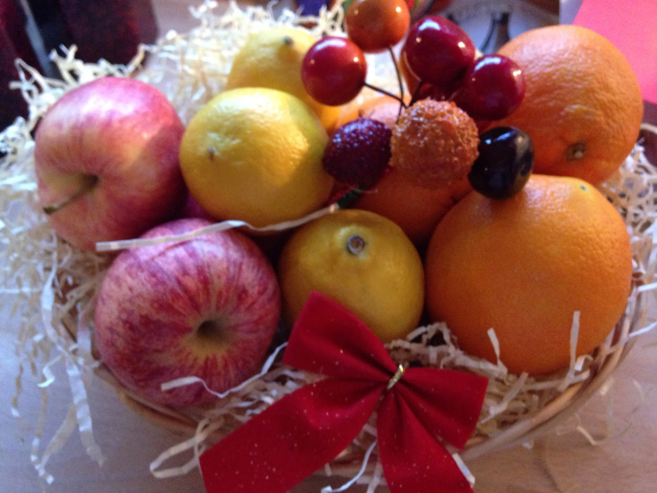 Fruit basket with some festive decorations.